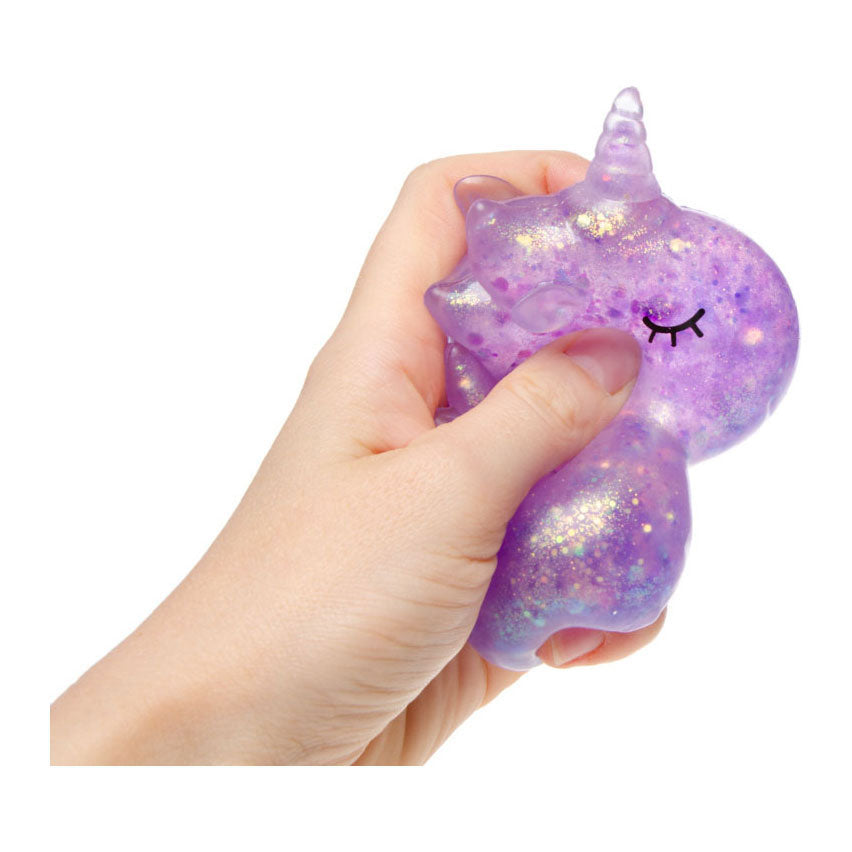 Juguete exprimidor con purpurina de unicornio.