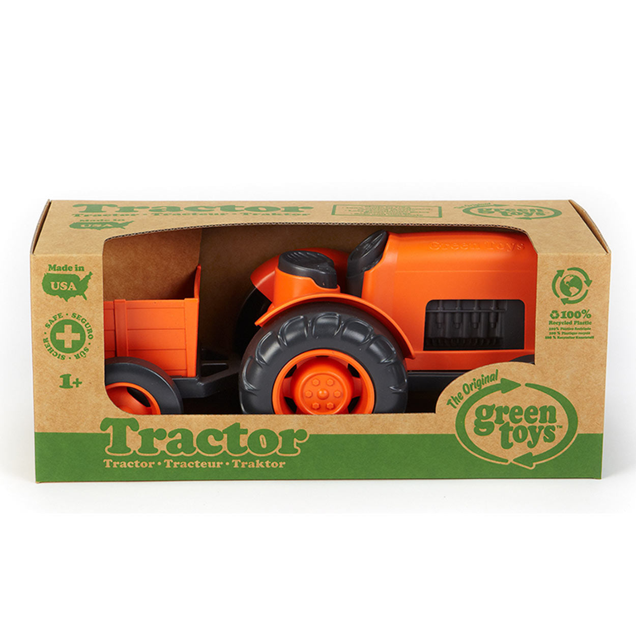 Tractor de juguetes verdes con remolque naranja