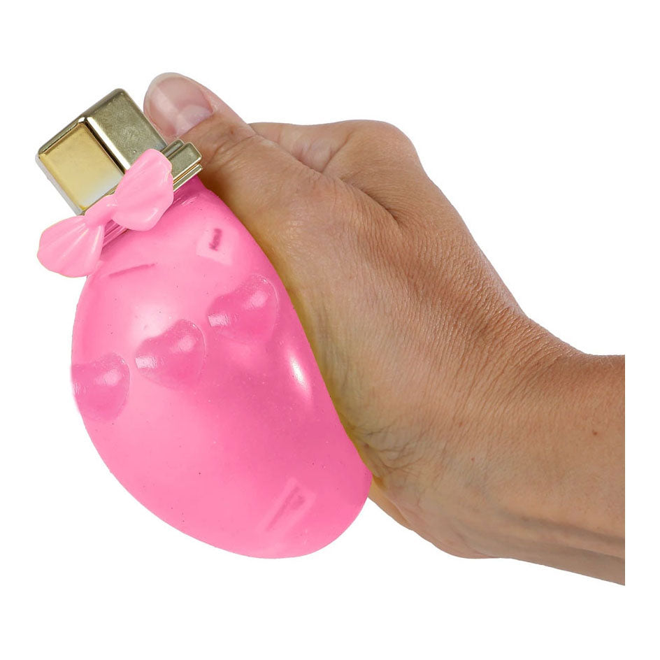 Flacone di profumo glamour con ciondoli