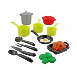 Sartén con herramientas de cocina