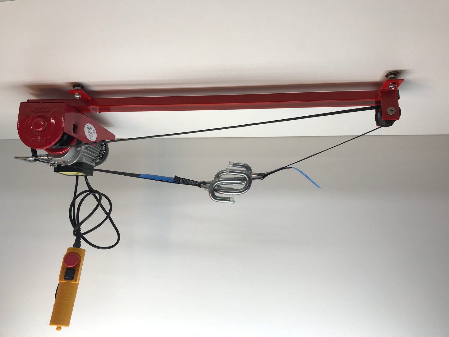 Sollevatore per biciclette Takel Co rosso con pneumatico nero 125 kg