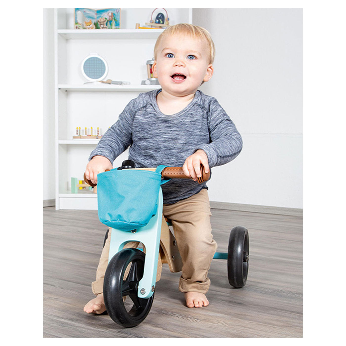 Triciclo di legno a piede piccoli e 2in1 turchesi