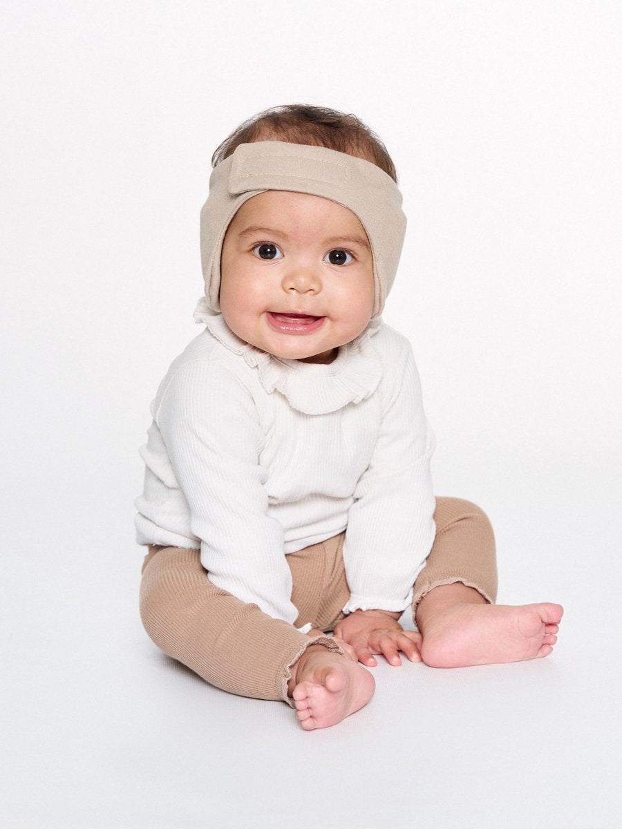 Dooky® protección auditiva para bebés dooky - diadema ajustable suave - 0-6 meses - beige - algodón oeko-tex - ligero y cómodo