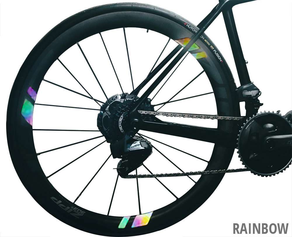 I riflettori della ruota del fascio lampeggiano 2.0 - arcobaleno nero