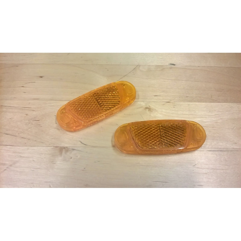Juego de 2 reflectores de radios naranjas.