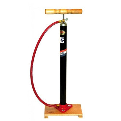 Bomba de bicicleta en la tabla de madera con Dunlop Valiel