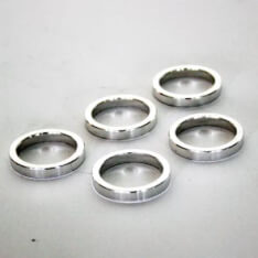 Bolsa A 5 puestos de anillo de relleno de cabeza 1.1 8 espaciador plateado de 5 mm