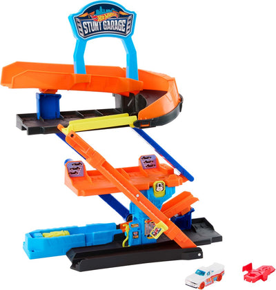 Hot Wheels City Transforming Stunt Garage Playset y coche de metal