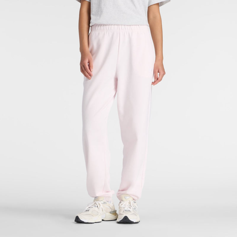 Pantalón de mujer New Balance sport Essentials French Terry Jogger - rosa sal