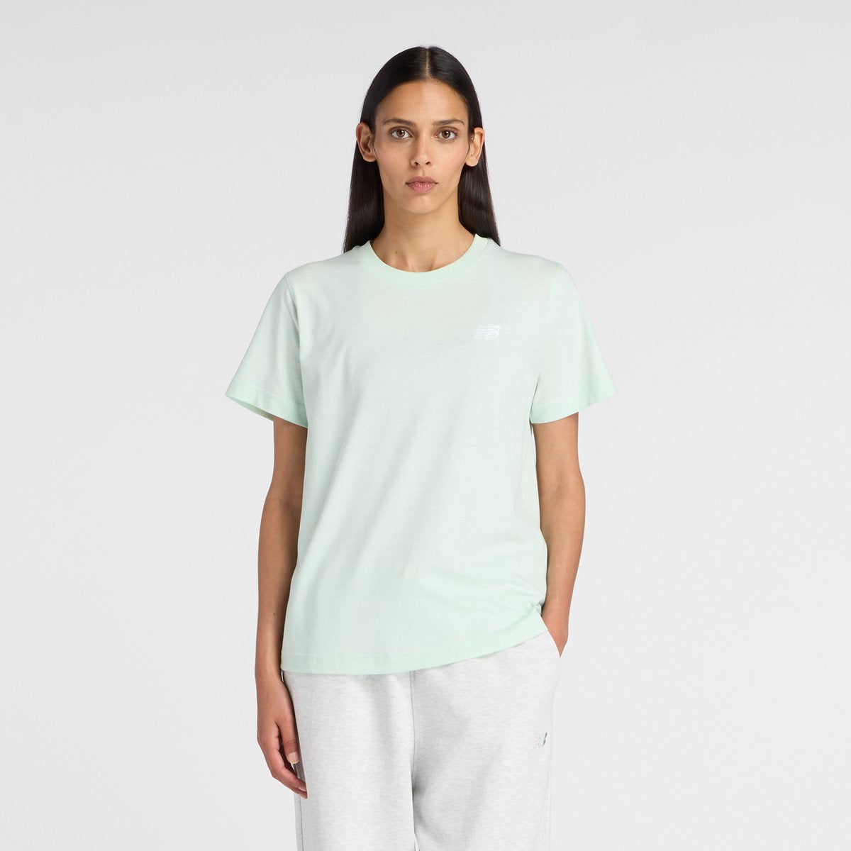 T-shirt da donna in jersey New Balance Sport Essentials - giada cosmica
