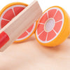 Juego de corte de frutas de madera.