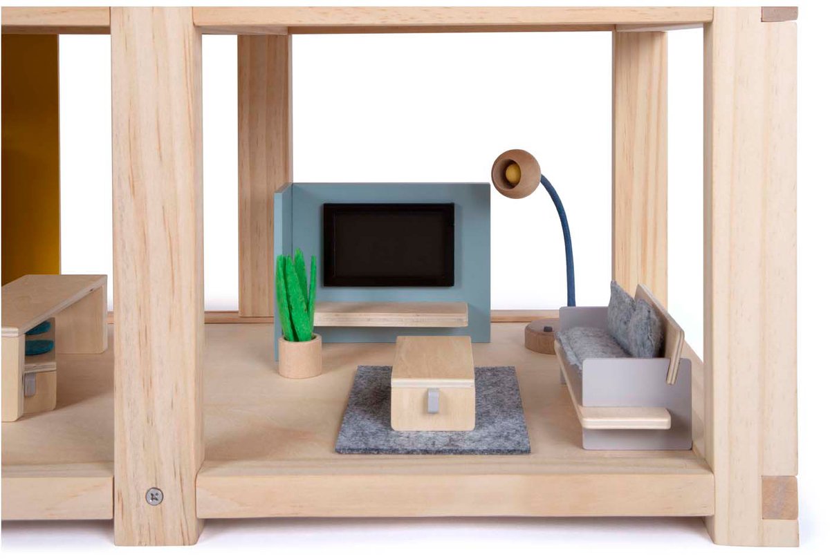 Casa de muñecas de madera pequeña con muebles