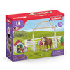 Los invitados de Schleich Horse Club Hannah con Ruby Hond 42458