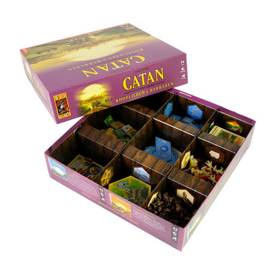 999Games Catan Expansión de comerciantes y juego de mesa bárbaro