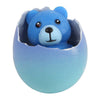 Groeiend teddy beertje in ei