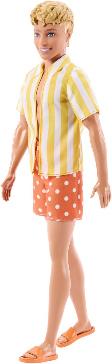 Barbie Ken in stile fashionistas, con capelli biondi avvolti in un tappetino