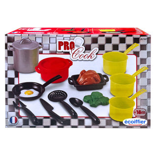 Sartén con herramientas de cocina