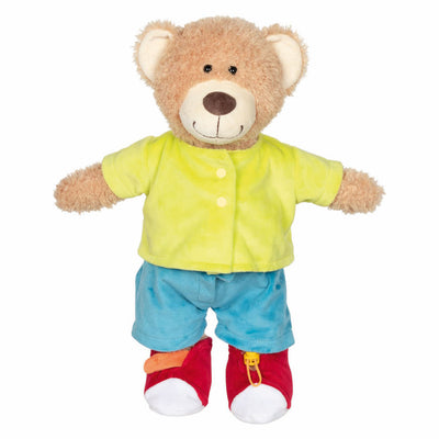 Il ciclomotore dell'orsacchiotto Goki impara a vestire il peluche
