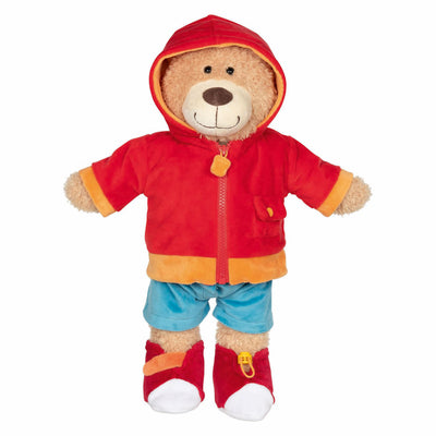 Il ciclomotore dell'orsacchiotto Goki impara a vestire il peluche