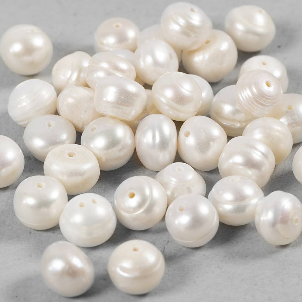 Creativ company perlas de agua dulce, perforadas longitudinalmente, d 4 mm, medida agujero 1 mm, nácar, 40 piezas 1 caja