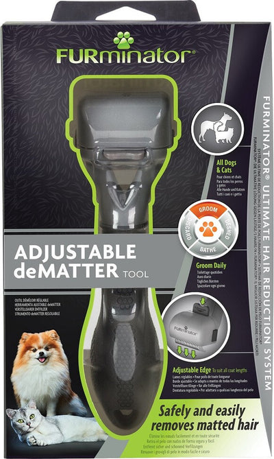 Furminator grooming dog and cat dematting tool