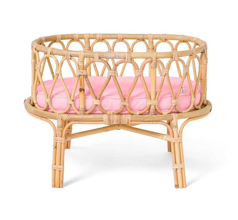 Cuna para muñecas de ratán con colchón rosa