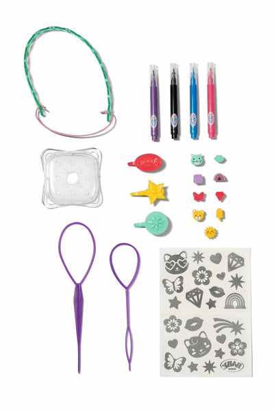 Rotulador y accesorios para peinar Baby Born.
