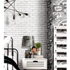 Noordwand behang urban friends coffee bricks grijs en wit