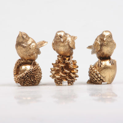 Season inspired decoation vogel op noot goud 5x3x6cm