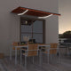 Vidaxl Luifel estendibile manualmente con arancione da 350x250 cm a LED e marrone