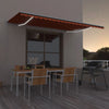 Vidaxl Luifel estendibile manualmente con arancione 500x300 cm a LED e marrone