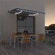 Vidaxl Luifel estendibile manualmente con LED 400x300 cm blu e bianco