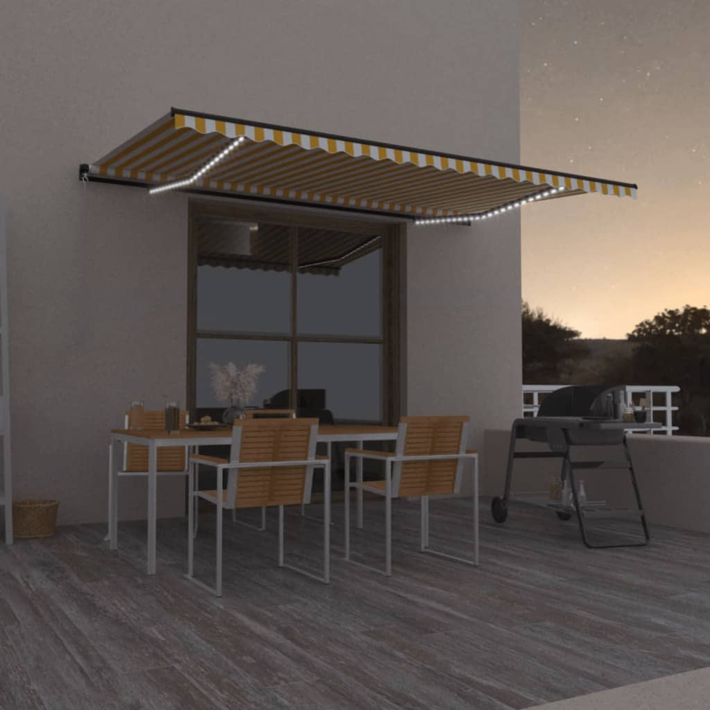 Vidaxl Luifel estendibile manualmente con LED 500x350 cm giallo e bianco