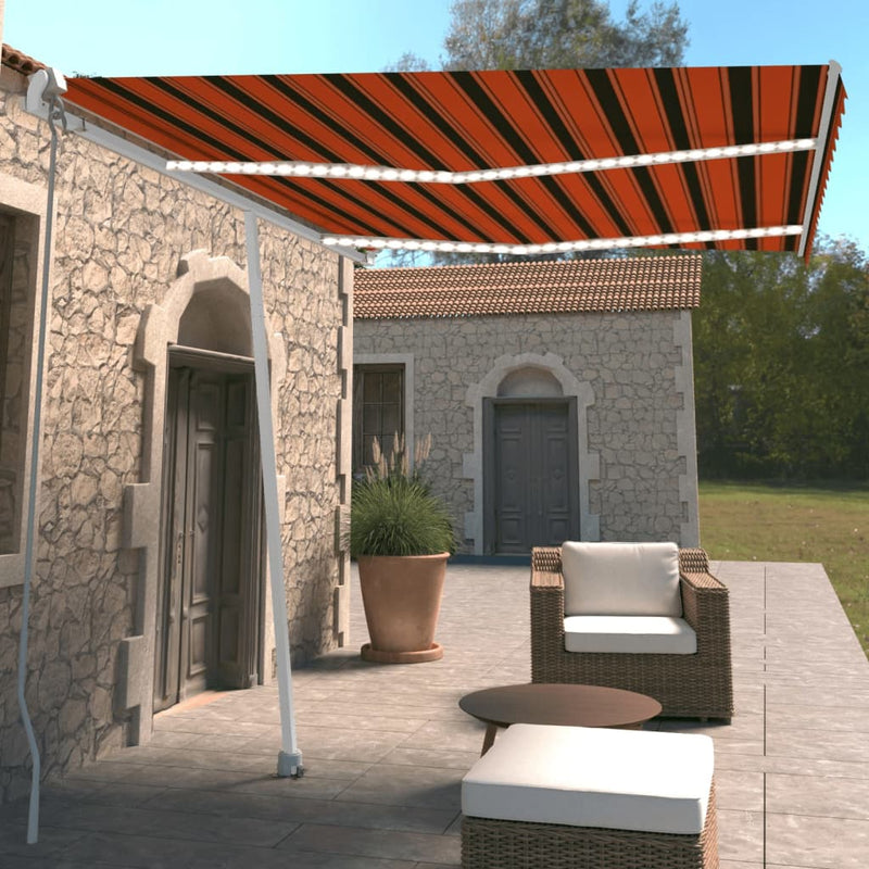 Vidaxl Luifel estendibile manualmente con arancione da 350x250 cm a LED e marrone