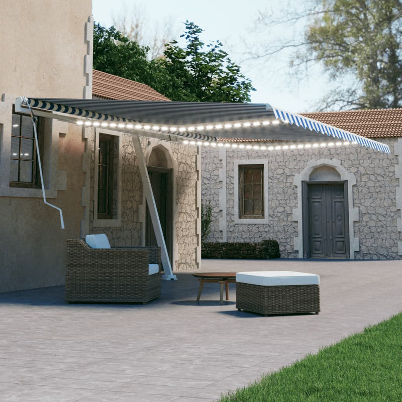 Vidaxl Luifel estendibile manualmente con LED 600x300 cm blu e bianco