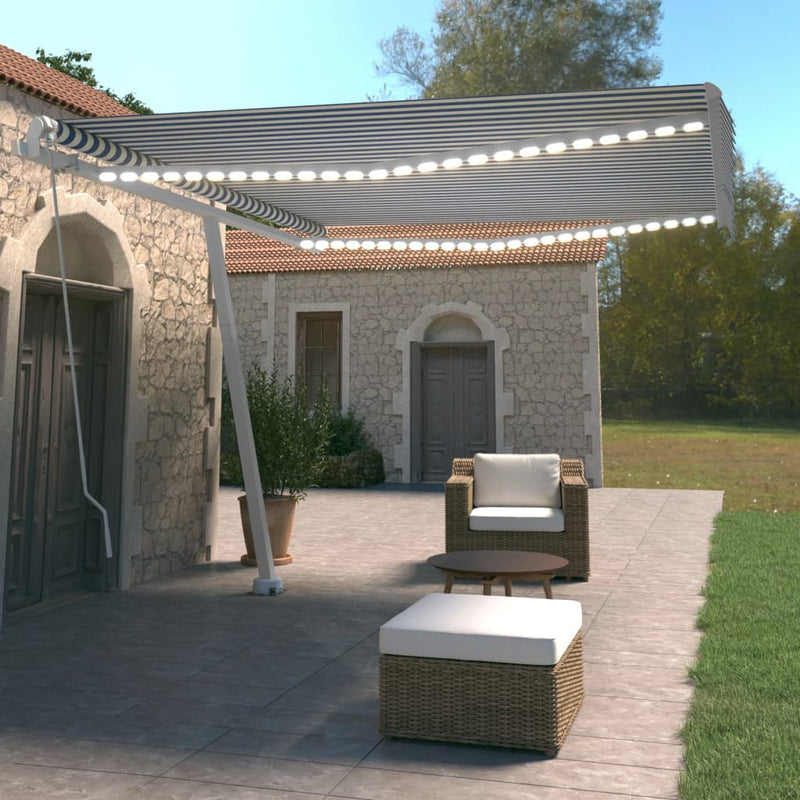 Vidaxl Luifel estendibile manualmente con LED 400x350 cm blu e bianco