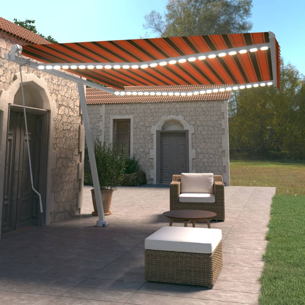 Vidaxl Luifel estendibile manualmente con arancione 400x350 cm a LED e marrone