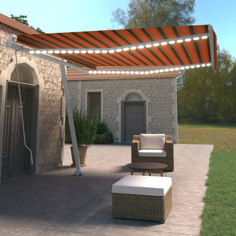 Vidaxl Luifel estendibile manualmente con arancione 400x350 cm a LED e marrone