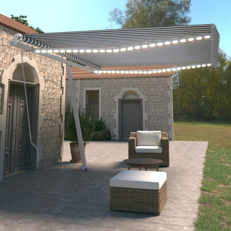 Vidaxl Luifel estendibile manualmente con LED 450x350 cm blu e bianco