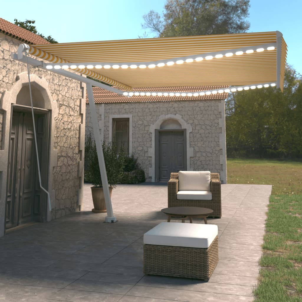 Vidaxl Luifel se puede extender manualmente con LED 450x350 cm amarillo y blanco