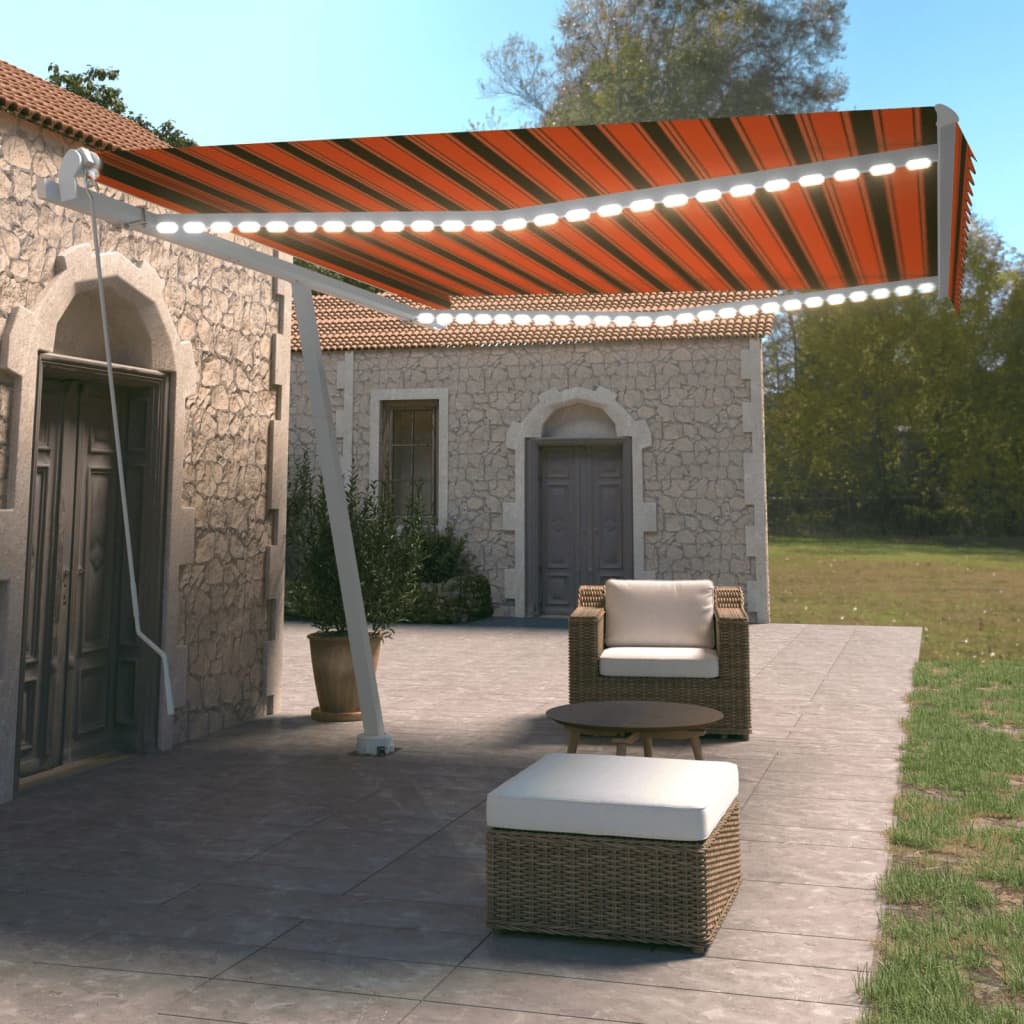 Vidaxl Luifel estendibile manualmente con arancione 450x350 cm LED e marrone