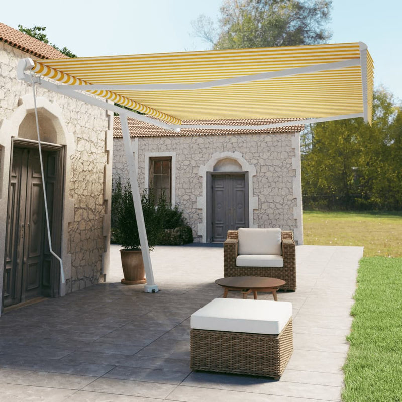Vidaxl Luifel distaccato manualmente estende 500x350 cm giallo e bianco