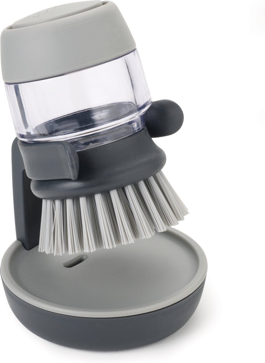 Spazzola per piatti Joseph Joseph Palm scrub con supporto per serbatoio del sapone - grigia