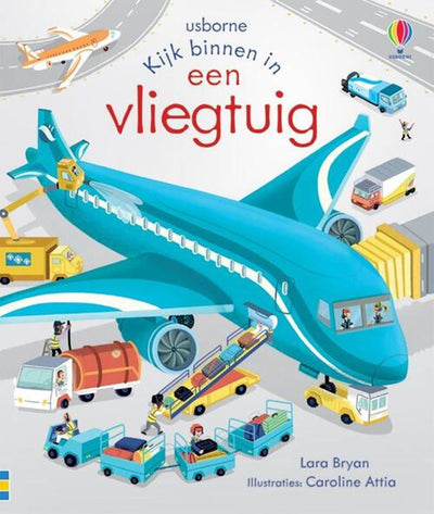 Los editores de Wpg miran el interior de un avión.