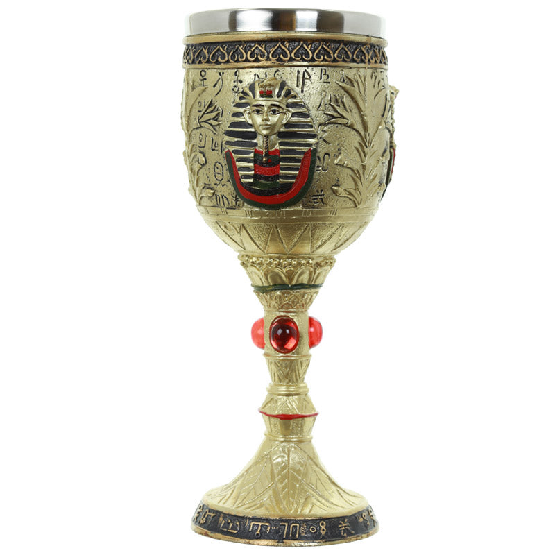 Calice egiziano decorativo d'oro