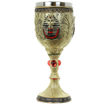 Cáliz egipcio dorado decorativo