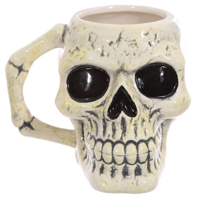 Taza de cerámica formada por calavera vieja