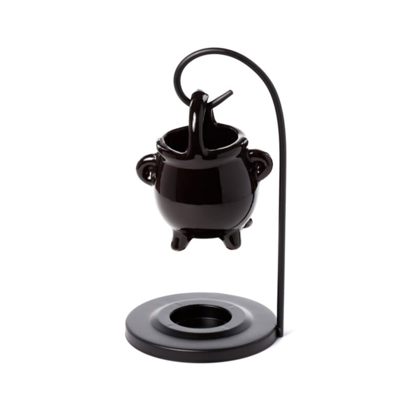 Burner di profumo appeso alla caldaia nera con supporto