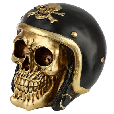 Skull dorato nell'accessorio per la casa