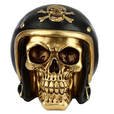 Skull dorato nell'accessorio per la casa